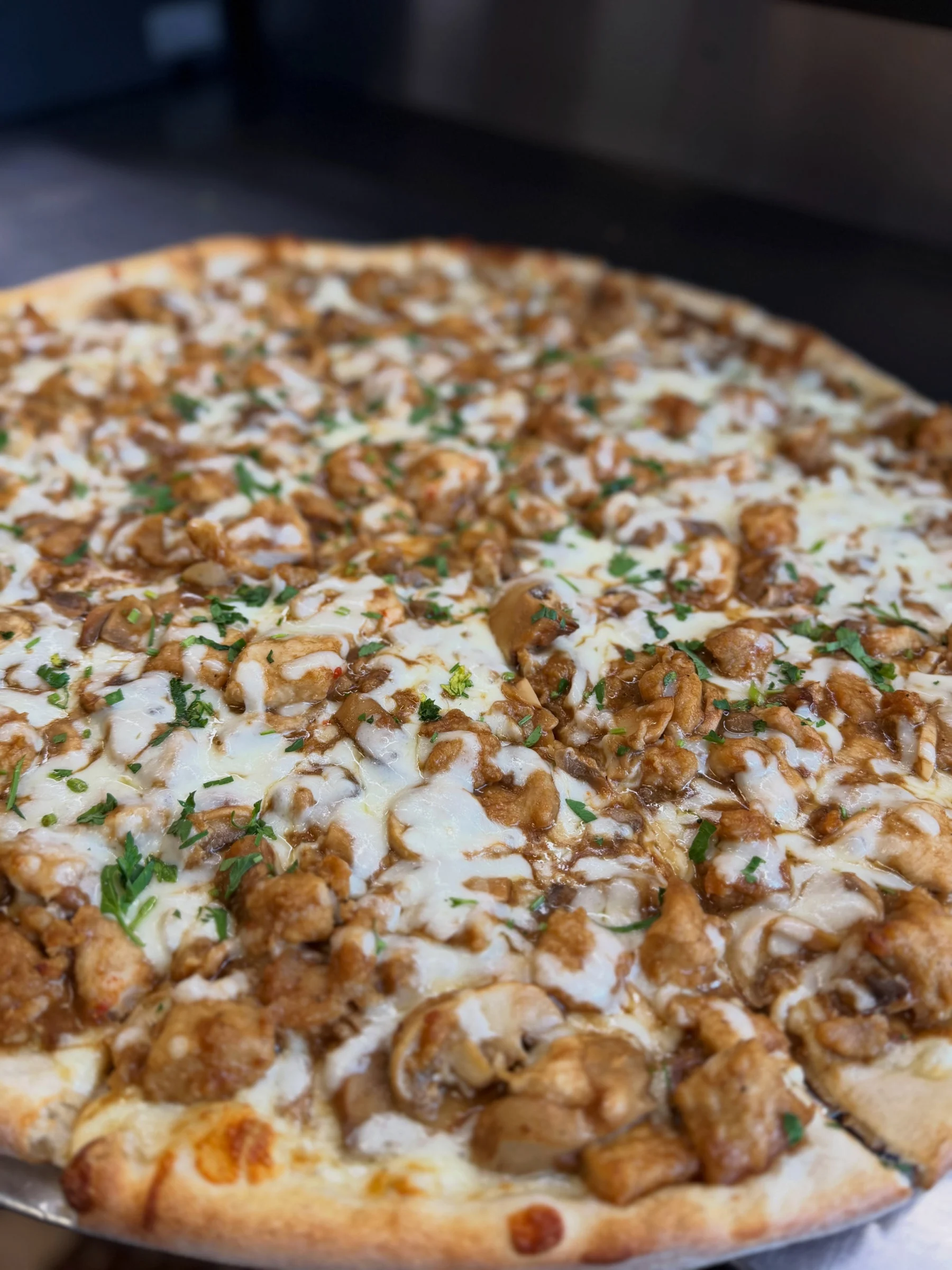 Chicken Marsala pizza made at Our Little Italy